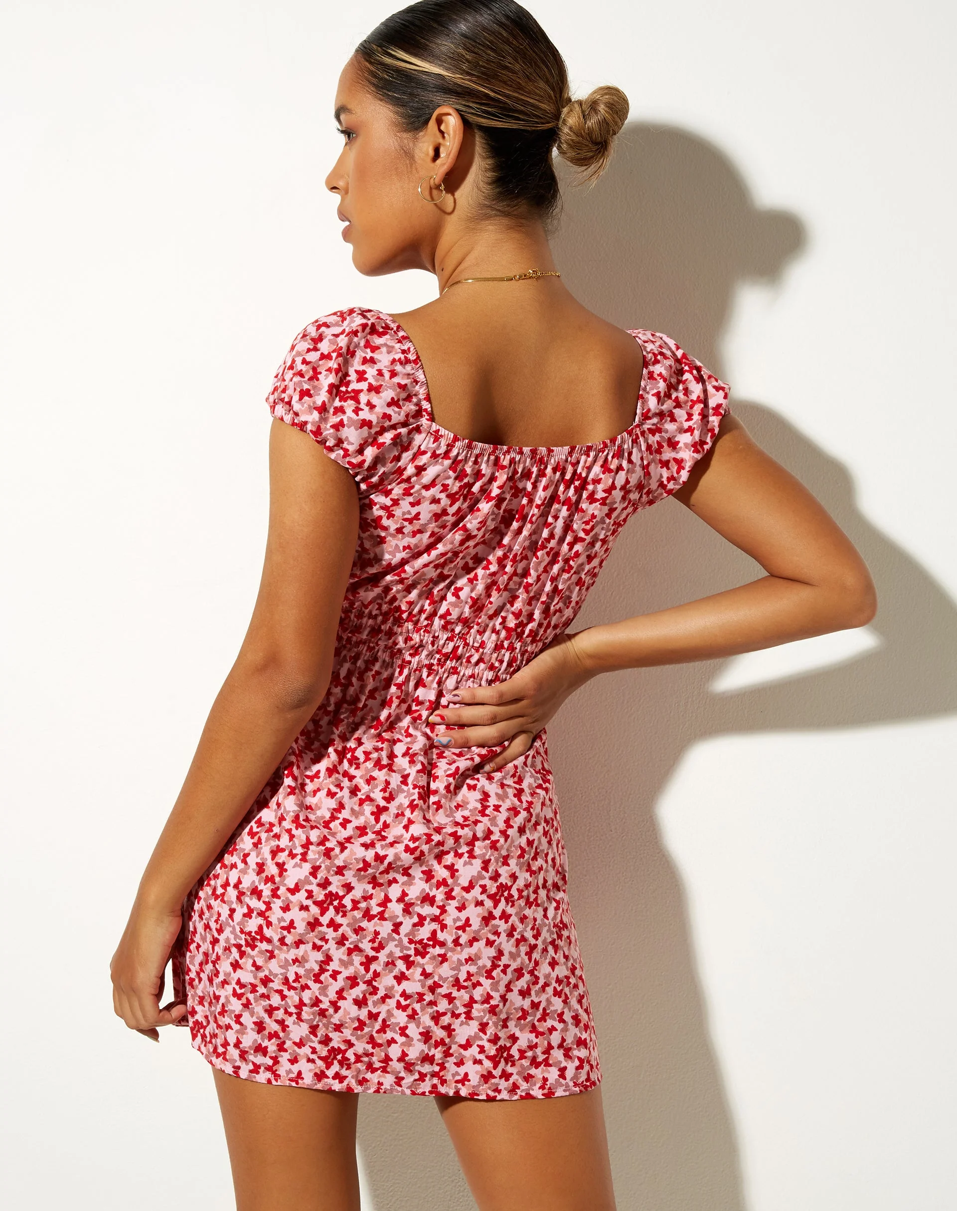 Galova Mini Dress in Ditsy Butterfly Peach and Red - Image 3